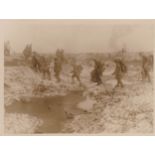 British WWI Press Photograph C.1125. "Tommie's going up to the Trenches" in the middle of Winter.
