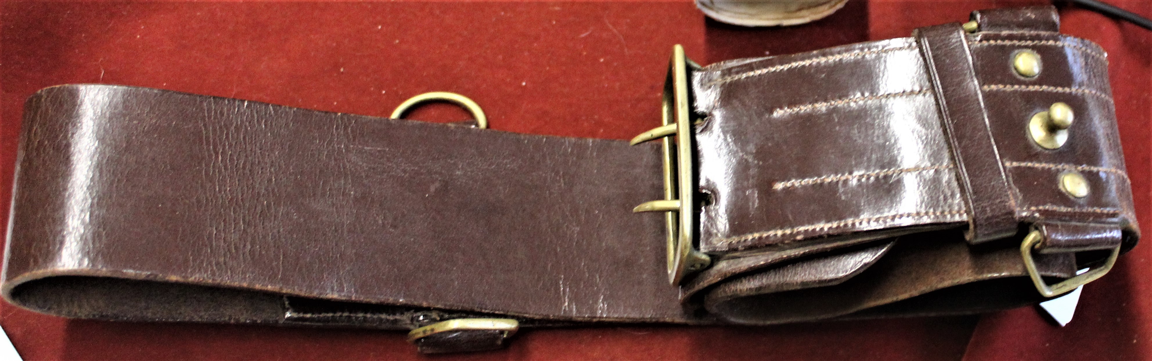 British Military Sam Browne Belt, leather in good condition with brass fittings missing the cross