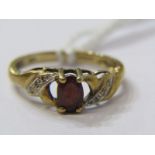 9ct YELLOW GOLD GARNET & DIAMOND RING, principal oval cut garnet with accent brilliant cut