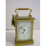 CARRIAGE CLOCK, coiled bar strike, brass cased bevelled glass carriage clock by Pridham Sons of