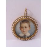 QUALITY SIGNED MINIATURE OF YOUNG BOY IN YELLOW METAL, tests gold & seed pearl mounted pendant