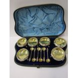 CASED SET OF 6 VICTORIAN SILVER GILT SALTS, set of 6 floral embossed circular salts with gilt