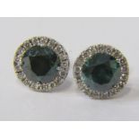 A PAIR OF 14ct WHITE GOLD BLUE DIAMOND STUD EARRINGS, Each diamond measuring approx 2ct,