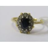 18ct YELLOW GOLD SAPPHIRE & DIAMOND CLUSTER RING, principal oval cut sapphire surrounded by accent