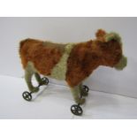 ANTIQUE STEIFF TOY, fabric covered pull along Cow, 10" length