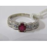 18ct WHITE GOLD RUBY & DIAMOND RING, principal oval cut ruby with baguette cut diamonds to each