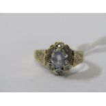 9ct YELLOW GOLD TOPAZ & DIAMOND RING, principal pale blue topaz surrounded by accent brilliant cut