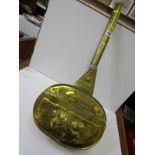 EARLY METALWARE, brass handled warming pan with embossed fish design decoration, 63cm length