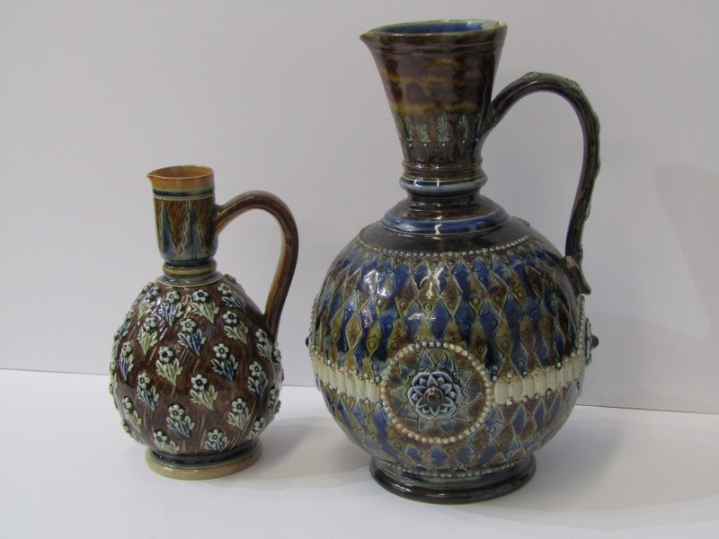 DOULTON STONEWARE, jug with florette applied decoration, 18cm, also larger 26cm jug (restored)