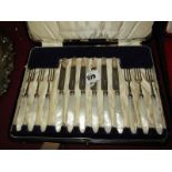 SILVER BLADED CUTLERY, set of 6 tea knives and forks with mother-of-pearl handles in fitted case,