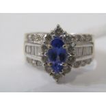 14ct WHITE GOLD TANZANITE & DIAMOND CLUSTER RING, principal marquise cut tanzanite in heavy 14ct