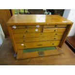 HOROLOGY, oak table top horologist cabinet with fall front door, 30cm height 46cm width with watch