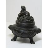 EASTERN METALWARE, Chinese bronze miniature incense burner, tripod base with temple dog finial lid &