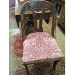 WILLIAM IV CARVED MAHOGANY SALON CHAIR, foliate and pierced back with sabre legs