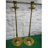 METALWARE, impressive pair of brass circular based 58cm high candlesticks