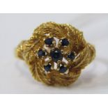 18ct YELLOW GOLD FLORAL DESIGN SAPPHIRE CLUSTER RING, 7 brilliant cut sapphires in the form of a