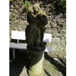 GARDEN STATUE, cast circular column supporting group of Courting Couple, 138cm