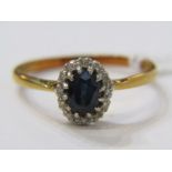 18ct YELLOW GOLD SAPPHIRE & DIAMOND CLUSTER RING, principal oval cut multi claw set sapphire