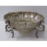VICTORIAN SILVER TABLE CENTRE, an ornate silver bowl with panels of fruit decorated in relief on 4