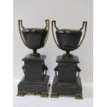 CLOCK GARNITURE, pair of black marble urn design garniture vases, 25cm height (some damage)