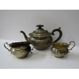 MATCHED SILVER BACHELOR TEA SET, silver teapot with ebony handle and finial with matching milk,