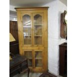 PINE CORNER CABINET, 19th Century glazed pine double door corner cupboard, 95cm width