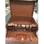 VINTAGE LUGGAGE, a quality leather gentleman's fitted vanity case with canvas cover, 56cm width
