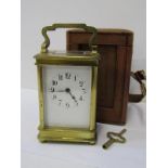 CARRIAGE CLOCK, bevelled glass brass cased carriage clock with key, 12cm height, together with