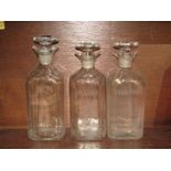 GEORGIAN GLASSWARE, 3 square base spirit decanters "Rum/Brandy/Hollands"