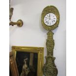 ANTIQUE FRENCH WALL CLOCK, an ornate embossed brass large open pendulum wall clock, floral decorated