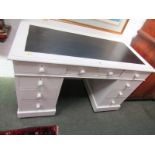 PAINTED KNEEHOLE DESK, twin pedestal desk of 9 white painted drawers, 120cm width