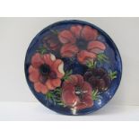 MOORCROFT, blue ground "Anemone" pattern shallow bowl, Queen Mary paper label, 18cm dia