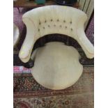 EDWARDIAN TUB ARMCHAIR, buttonback panel with fluted legs and original castors