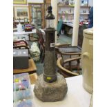 SERPENTINE, a large serpentine lighthouse table light, 46cm height