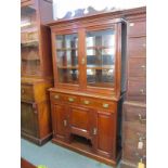 EDWARDIAN WALNUT GLAZED TOP TWIN DOOR BOOKCASE, triple cupboard base with twin frieze drawers and