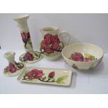 MOORCROFT, "Magnolia" pattern, collection 5 pieces tableware to include 2 candlesticks and pin tray