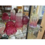 ANTIQUE OIL LAMP SHADES, a cranberry crinoline glass shade and 3 others