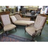 EDWARDIAN CARVED OAK FRAMED LOUNGE SUITE of chaise lounge, gentleman's and lady's armchair with