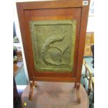 NEWLYN BRASS, fire screen decorated with embossed peacock on tree branch, originally from home of