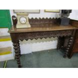 FLEMISH OAK HALL TABLE, a carved oak hall table on turned bobbin legs & carved back plate, 127cm