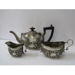 EDWARDIAN SILVER 3 PIECE TEA SERVICE, oval bodied with embossed floral and foliate design and carved