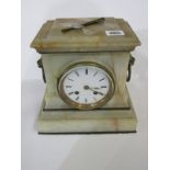 ANTIQUE CLOCK, onyx mantel clock with twin lion mask ring drop side handles with French striking