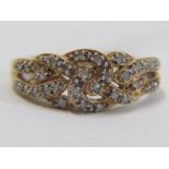 9ct YELLOW GOLD DIAMOND KNOT STYLE RING, size S