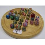 MARBLES, a solitaire board with 33 interesting marbles including a blue glass latticino, 4