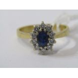 18ct YELLOW GOLD SAPPHIRE & DIAMOND CLUSTER RING, principal vivid blue sapphire surrounded by 10