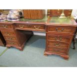 REPRODUCTION KNEEHOLE DESK, burr walnut 9 drawer facades with brass swan neck handles and green