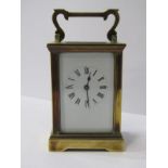 CARRIAGE CLOCK, brass cased bevel glass carriage clock with key, 12cm height