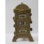 ART NOUVEAU PERPETUAL CALENDER, ornate brass cased table top calender, 18cm height