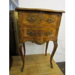 CONTINENTAL SERPENTINE FRONTED BEDSIDE CHEST, cross banded walnut two drawer bedside chest with gilt