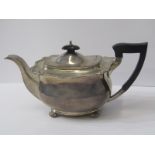 SILVER TEAPOT, serpentine topped scroll edged teapot with ebonised handle and finial with bun
